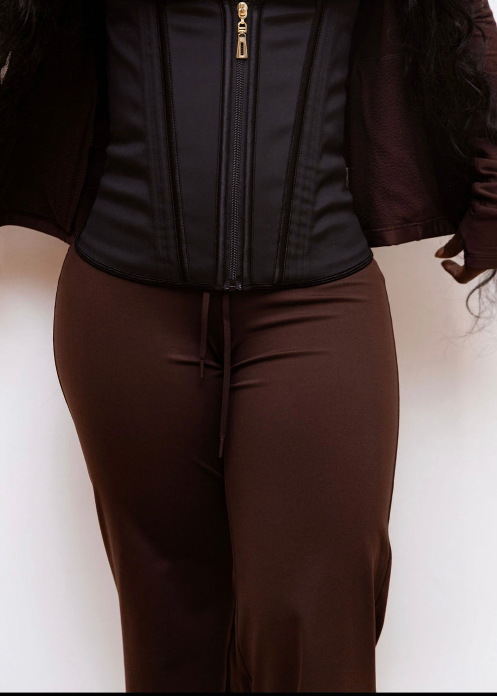 Close-up of Steel Bone Waist Trainer showing boning structure and gold zipper hardware