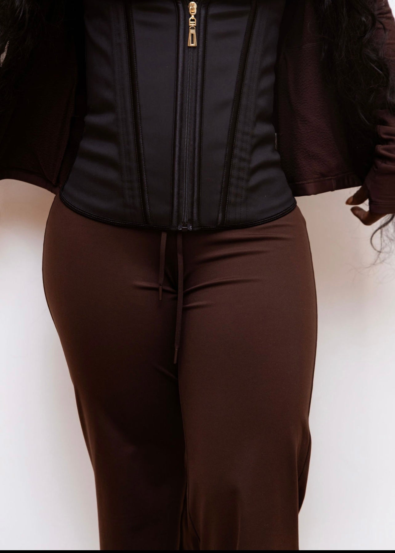 Close-up of Steel Bone Waist Trainer showing boning structure and gold zipper hardware